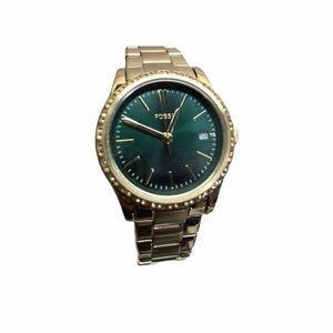 Fossil Watch with Gold Band and Green Dial